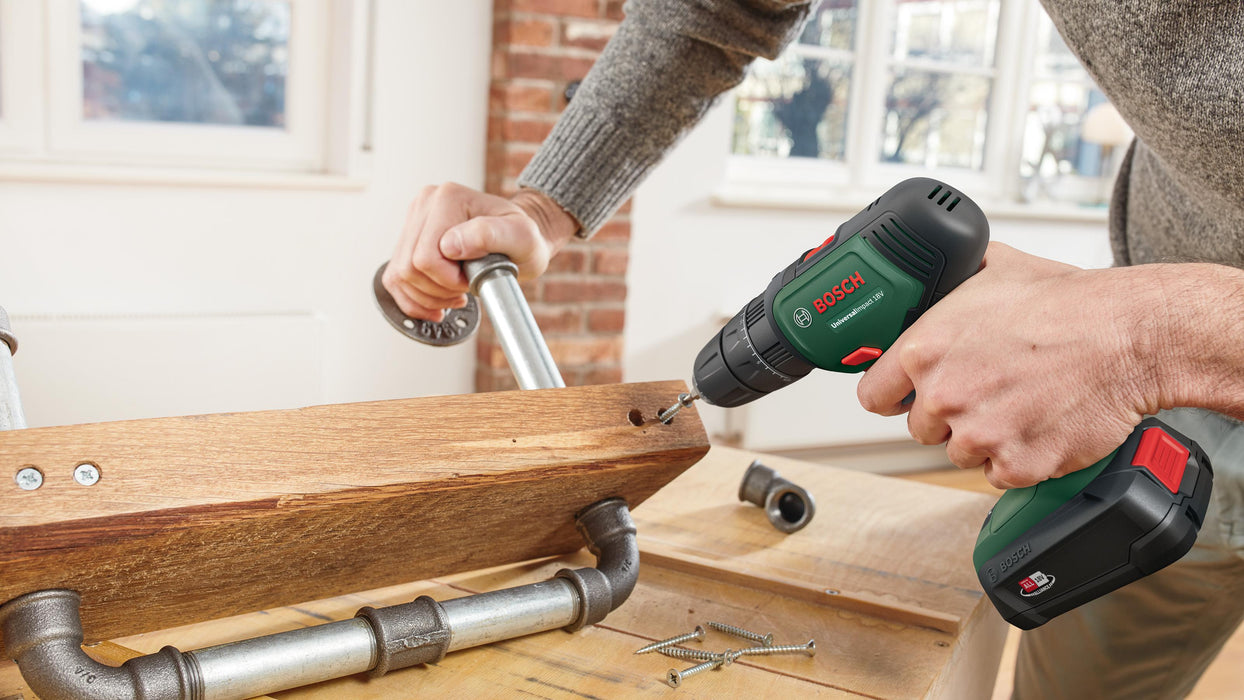 BOSCH UniversalImpact 18V + SystemBox - Akku-bušilica sa udarcima UniversalImpac (06039D4103) Power Tools BOSCH Madras doo Beograd